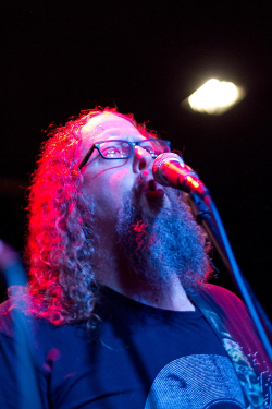 Photo: Dan Davis on bass guitar. Photo Credit: Terrence McNally